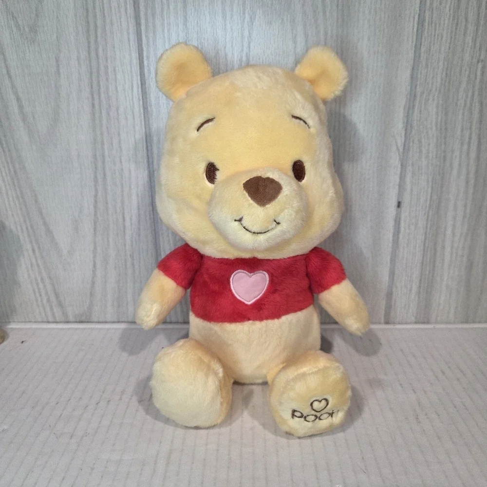 Disney Baby Winnie the Pooh Stuffed Animal, crinkle hands, heart emblemed